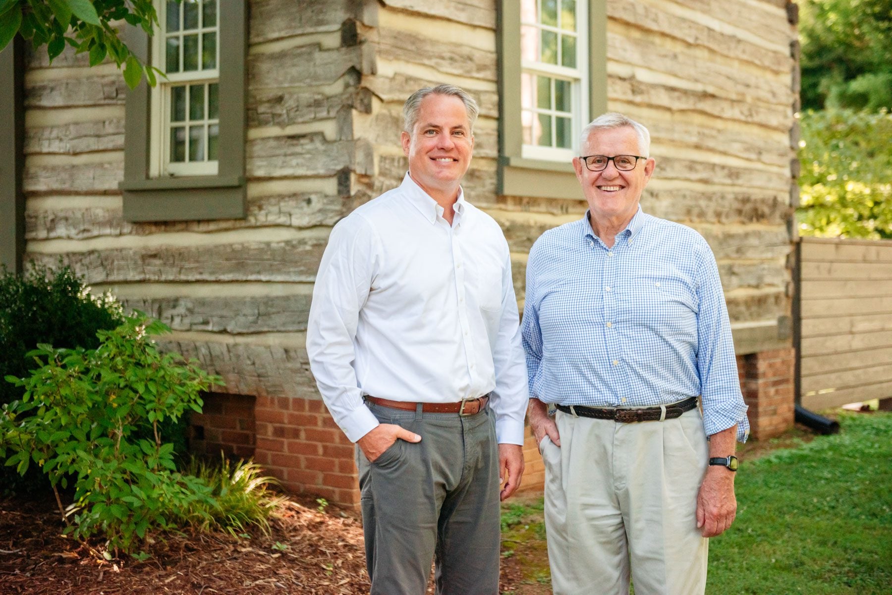 Taylor Hobbs and Grimsley Hobbs outside their office located in the historical Lewis Freeman House.