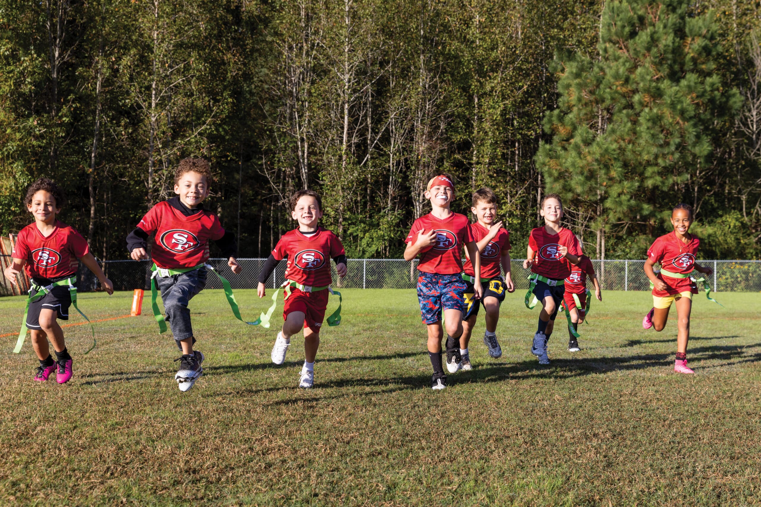 Chatham's Flag Football Elite team runs down field