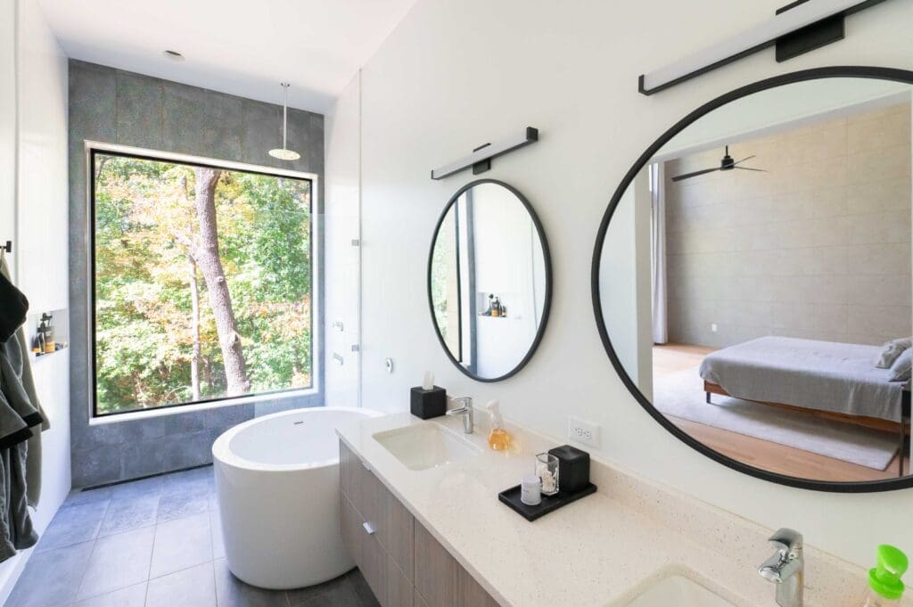 The master bedroom offer a unique Japanese soaking tub and views of the outdoors.