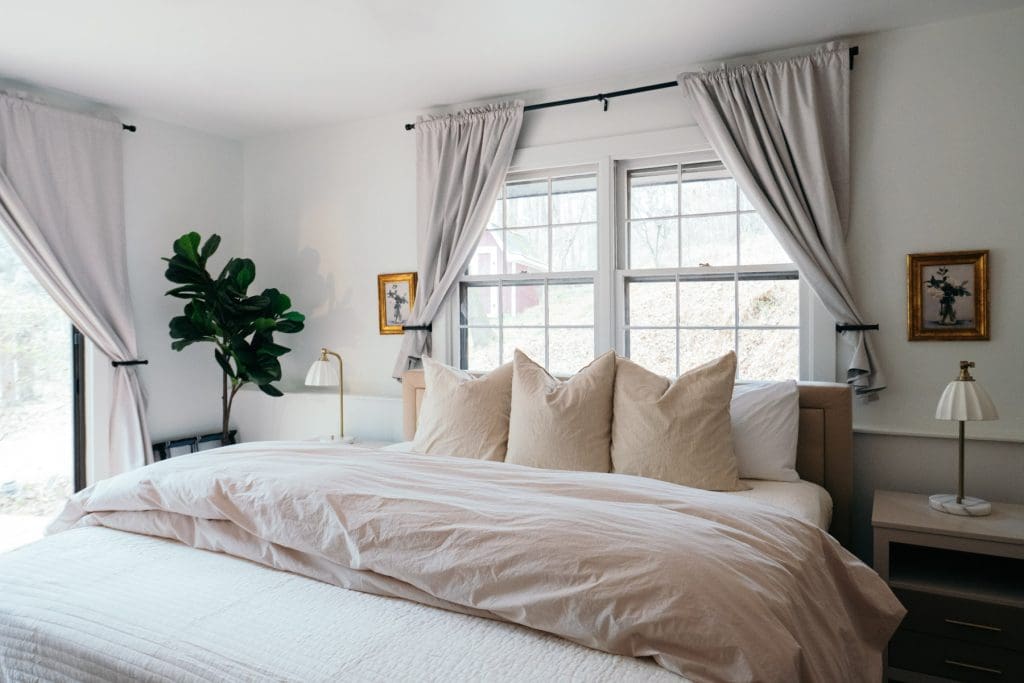 A comfortable bed awaits guests in the main bedroom of the Loblolly House. 