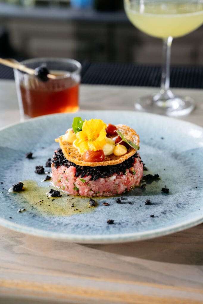 Beef tartare and craft cocktails from one of Chatham County's best restaurants: The Fearrington House Restaurant.